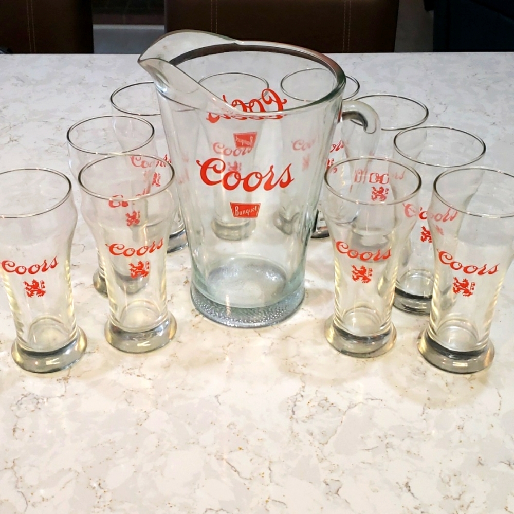 Vintage 1970s Coors banquet pitcher and 10 glasses
